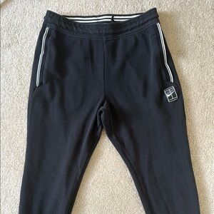 Nike Tennis Dri-Fit Black Joggers with White Stripe Detail
